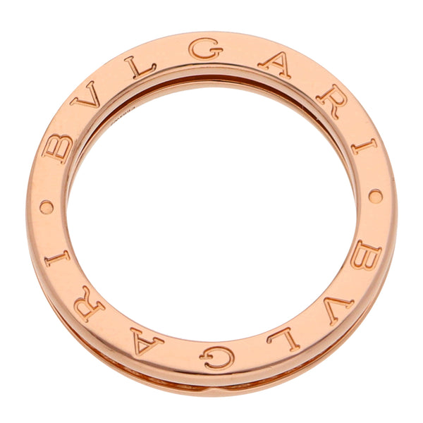 Argolla hechura especial con diamantes firma Bvlgari en oro rosa 18 kilates.