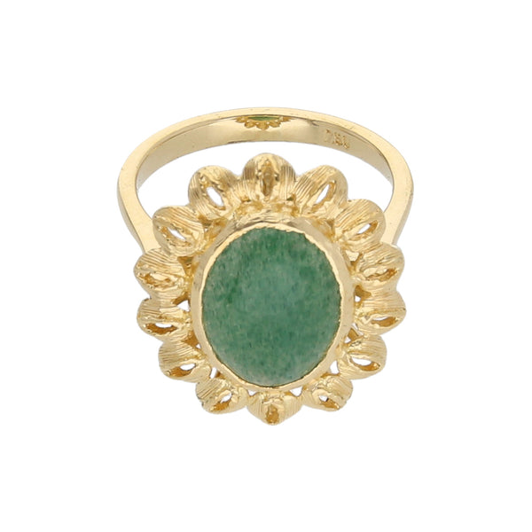 Anillo tipo sello motivo flor con sintético en oro amarillo 18 kilates.