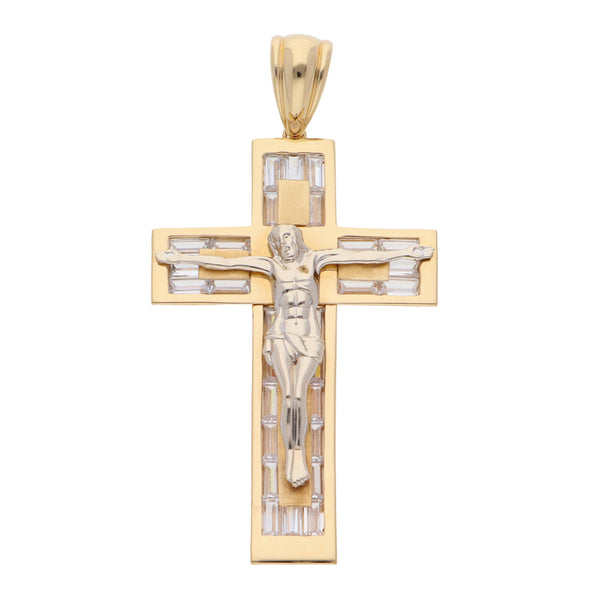 Crucifijo hechura especial con sintéticos en oro dos tonos 14 kilates.