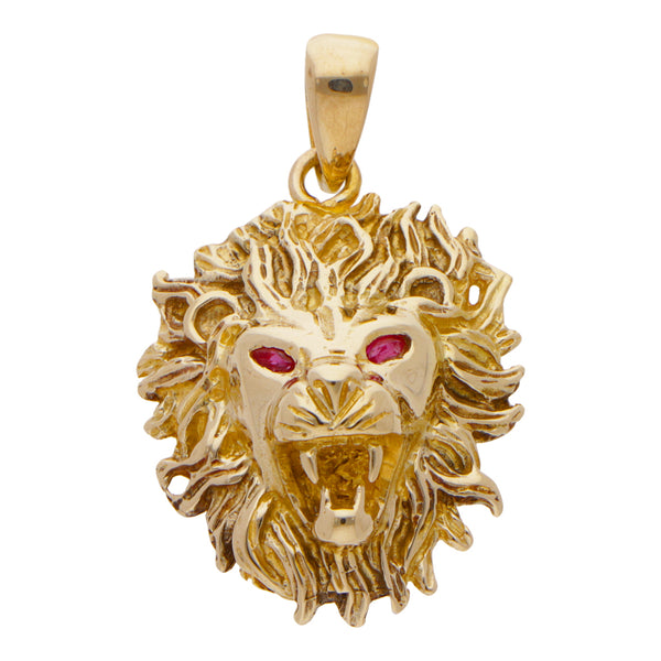 Dije estilizado motivo león con rubíes en oro amarillo 14 kilates.