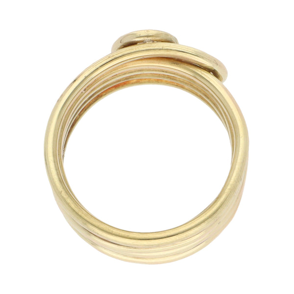 Anillo estilizado en oro amarillo 18 kilates.