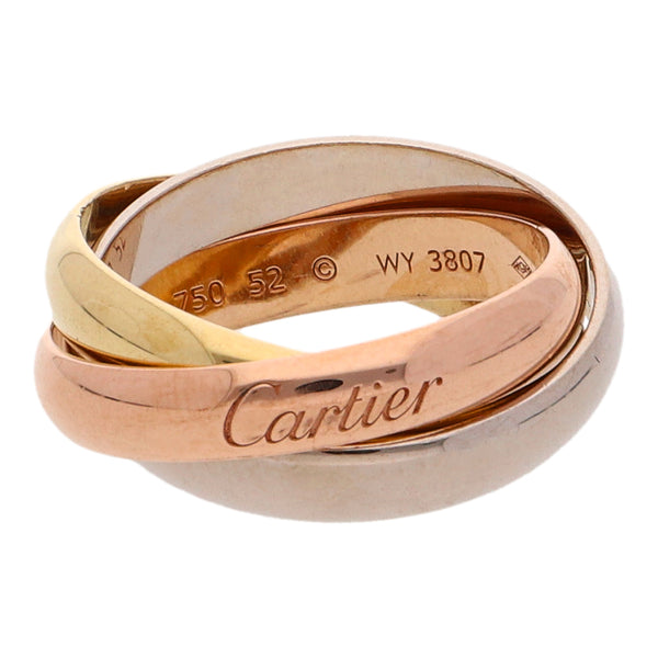 Alianza tres piezas lisas firma Cartier en oro tres tonos 18 kilates.