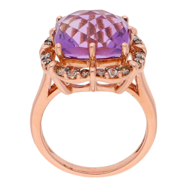 Anillo hechura especial con amatista diamantes y sintéticos en oro rosa 14 kilates.