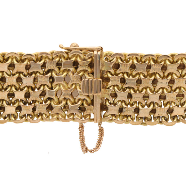 Pulsera eslabón palmeado en oro amarillo 18 kilates.