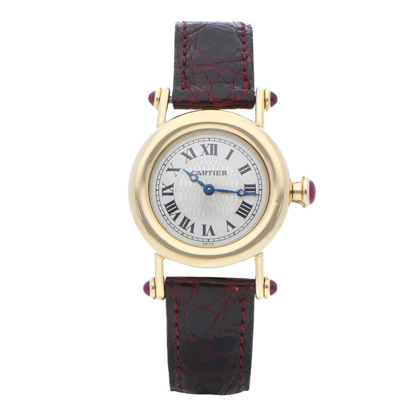 Reloj Cartier para dama en oro correa piel.