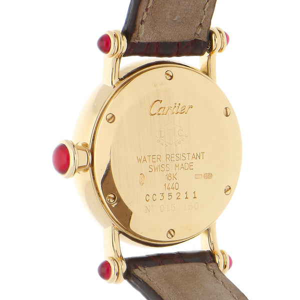 Reloj Cartier para dama en oro correa piel.