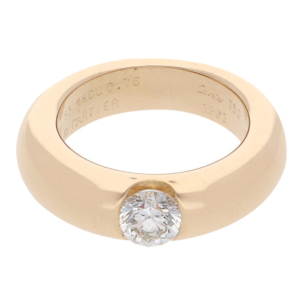 Anillo hechura especial con diamante firma Cartier en oro amarillo 18 kilates.