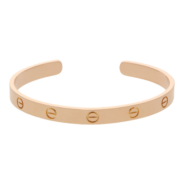 Pulsera abierta firma Cartier en oro rosa 18 kilates.