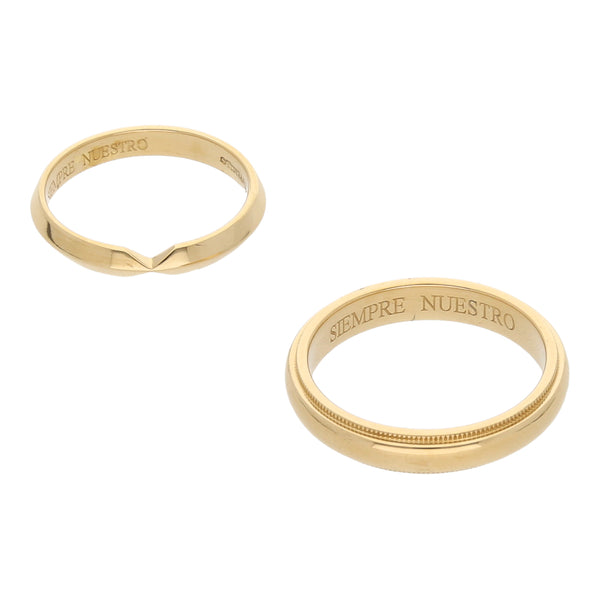 Dos argollas diseño especial firma Tiffany & Co. oro amarillo 18 kilates.