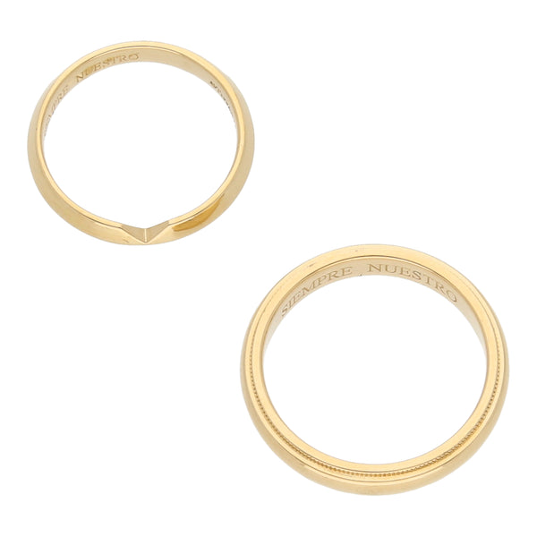 Dos argollas diseño especial firma Tiffany & Co. oro amarillo 18 kilates.