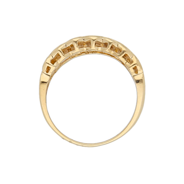 Anillo calado motivo corazones con sintéticos en oro amarillo 18 kilates.