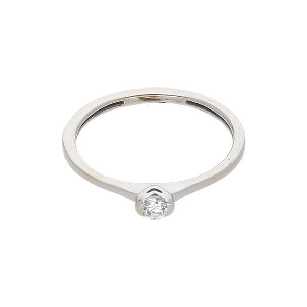 Anillo liso con circonia en oro blanco 14 kilates.