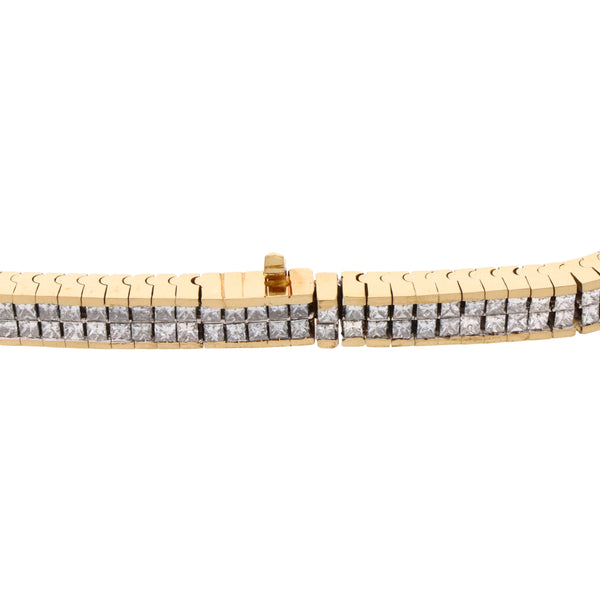 Pulsera eslabón articulado con diamantes en oro amarillo 18 kilates.