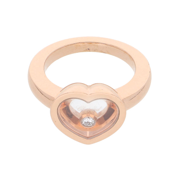 Anillo hechura especial motivo corazón firma Chopard con diamante flotante en oro rosa 18 kilates.