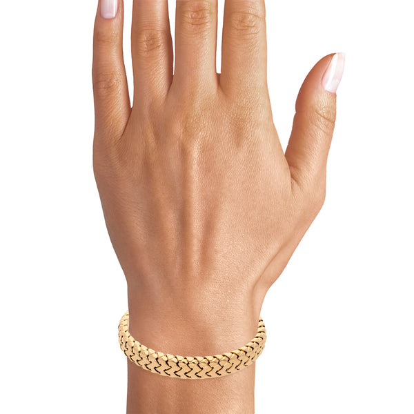 Brazalete abierto firma Tiffany & Co. en oro amarillo 18 kilates.