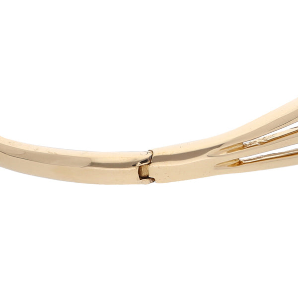 Pulsera de arillo articulada con diamantes en oro dos tonos 18 kilates.