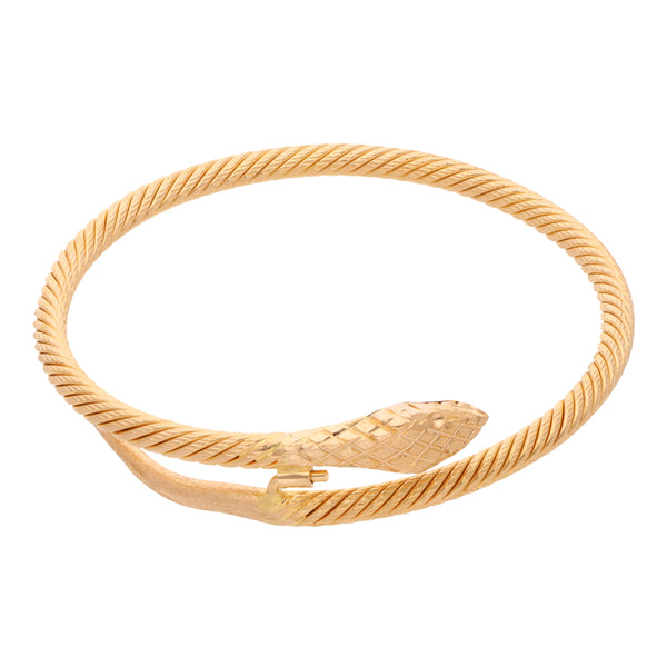 Brazalete estriado motivo serpiente en oro amarillo 18 kilates.