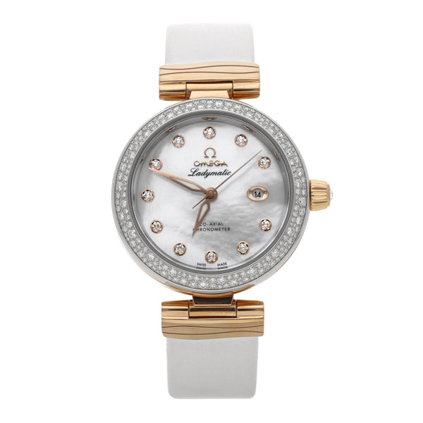 Reloj Omega para dama modelo Ladymatic vistas en oro amarillo 18 kilates.