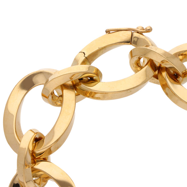 Pulsera eslabón uno por uno cruzado firma Tiffany & Co. en oro amarillo 18 kilates.