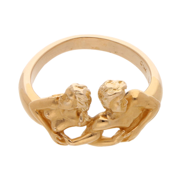 Anillo estilizado motivo pareja en oro amarillo 18 kilates.