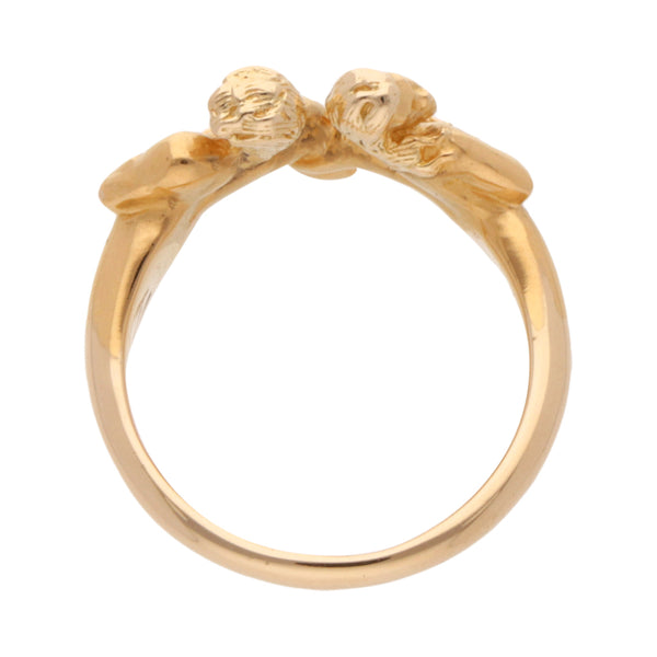 Anillo estilizado motivo pareja en oro amarillo 18 kilates.