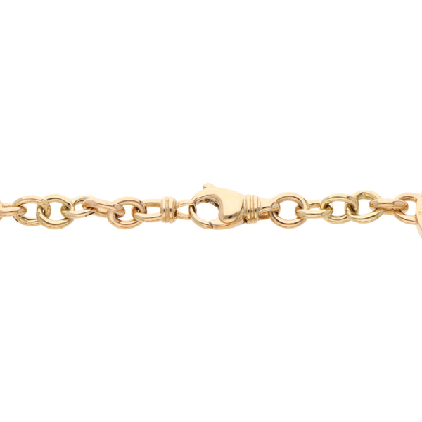 Pulsera eslabón cruzado con onix firma Bvlgari en oro amarillo 18 kilates.