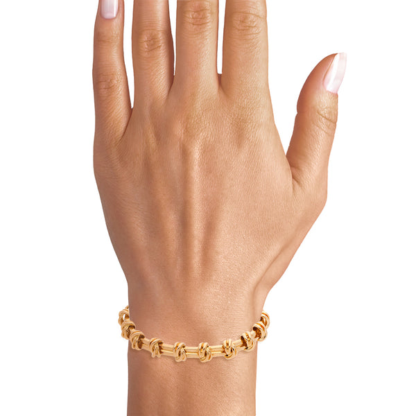 Pulsera articulada firma Tiffany & Co. en oro amarillo 18 kilates.