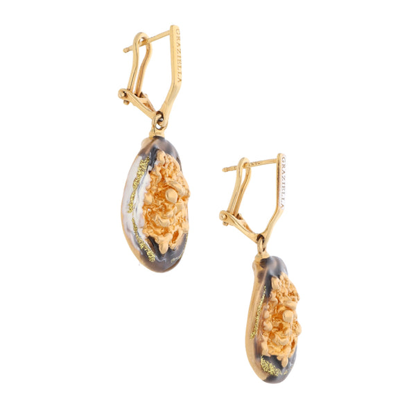 Aretes hechura especial con esmalte en oro dos tonos 14 kilates.