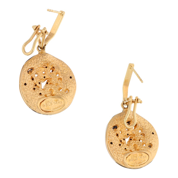 Aretes hechura especial con esmalte en oro dos tonos 14 kilates.