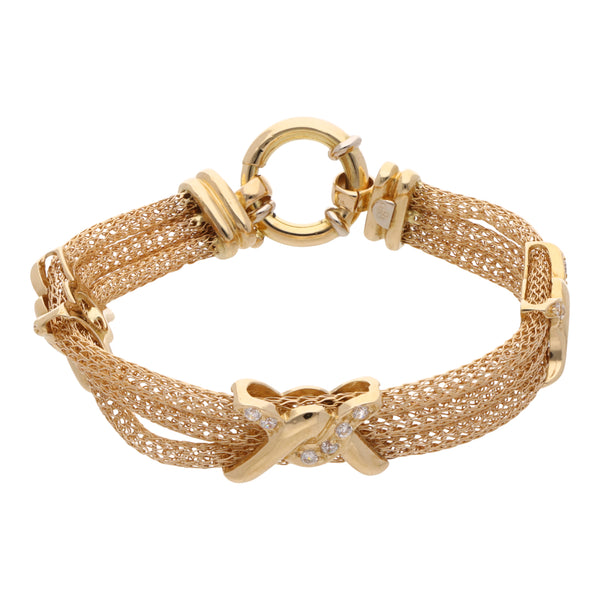 Pulsera eslabón tejido tres hilos con sintéticos en oro amarillo 18 kilates.