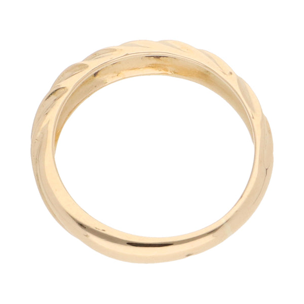 Anillo infantil estriado firma Tane en oro amarillo 18 kilates.