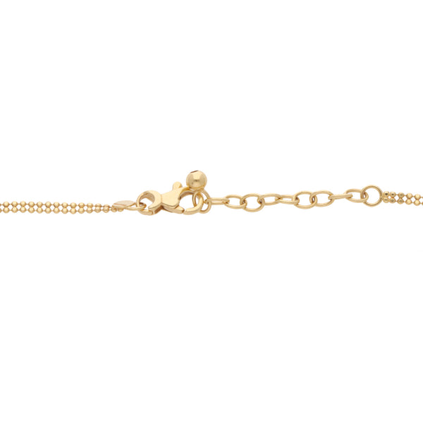 Pulsera con argolla eslabón boleado en oro amarillo 14 kilates.