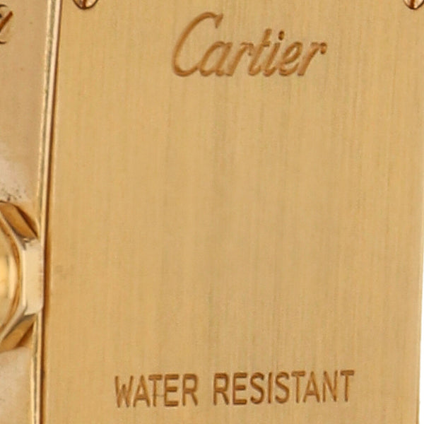 Reloj Cartier para dama modelo Tank Americaine caja en oro amarillo 18 kilates.