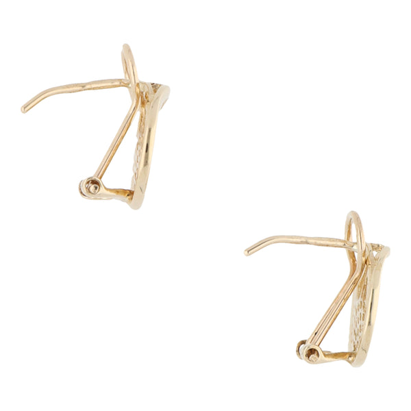 Aretes estilizados con sintéticos en oro amarillo 14 kilates.