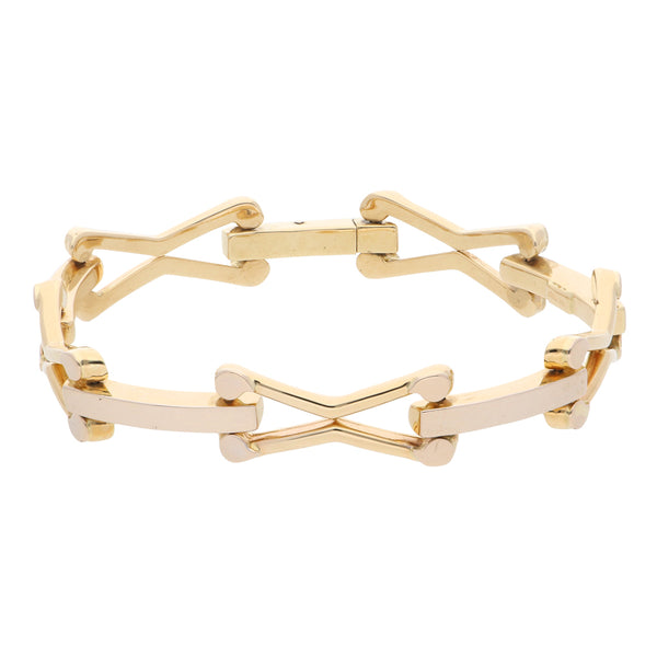 Pulsera eslabón combinado en oro dos tonos 14 kilates.