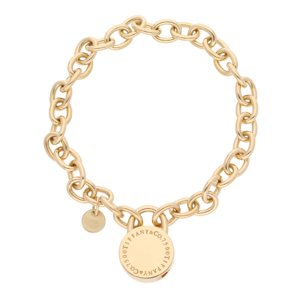 Pulsera eslabón cruzado firma Tiffany & Co. en oro amarillo 18 kilates.