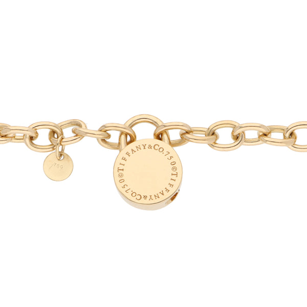 Pulsera eslabón cruzado firma Tiffany & Co. en oro amarillo 18 kilates.