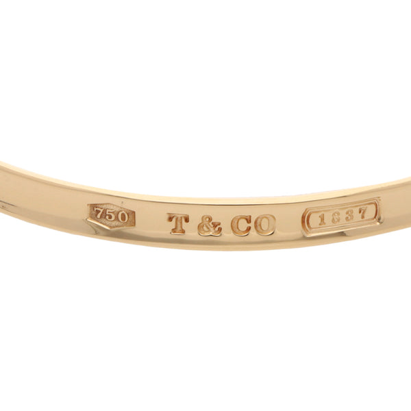 Pulsera de arillo hechura especial firma Tiffany & Co. en oro amarillo 18 kilates.