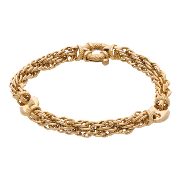 Pulsera eslabón combinado en oro amarillo 14 kilates.