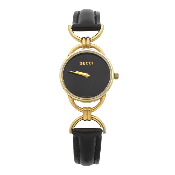 Reloj Gucci para dama en acero chapa correa piel.