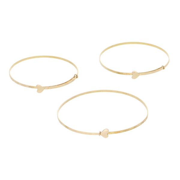 Tres pulseras de arillo estriadas para niña en oro amarillo 14 kilates.