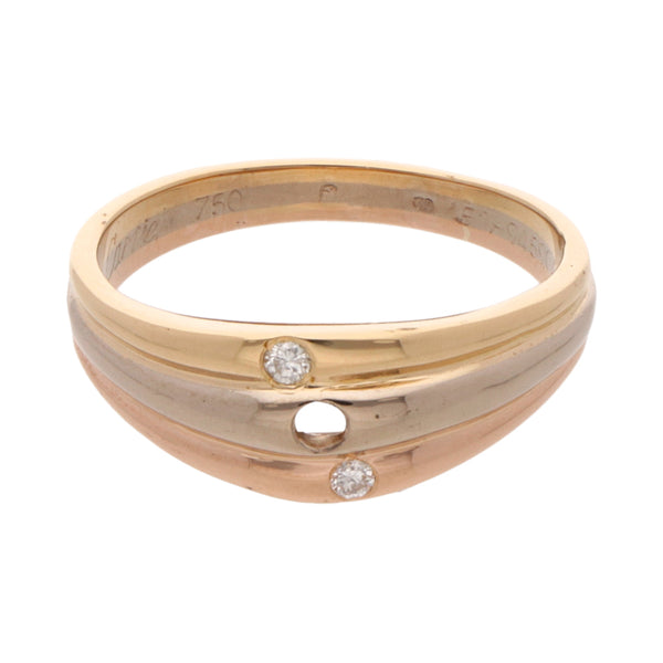 Anillo hechura especial con diamantes en oro tres tonos 18 kilates.