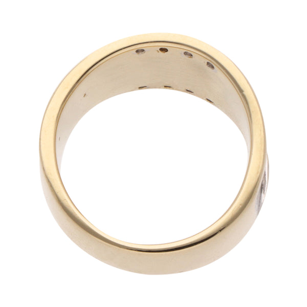 Anillo hechura especial motivo pantera con sintéticos en oro dos tonos 14 kilates.