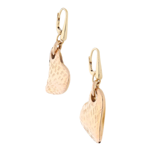 Aretes huecos con colgantes motivo corazón en oro amarillo 14 kilates.