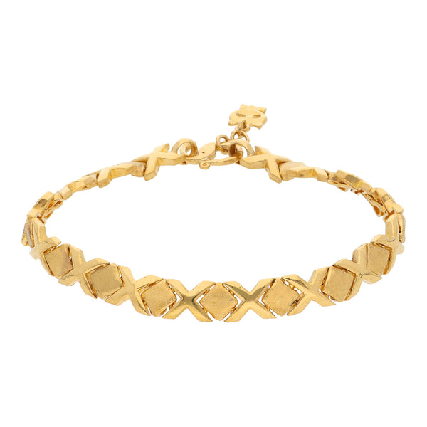 Pulsera eslabón XOXO con dije motivo gato en oro amarillo 24 kilates.