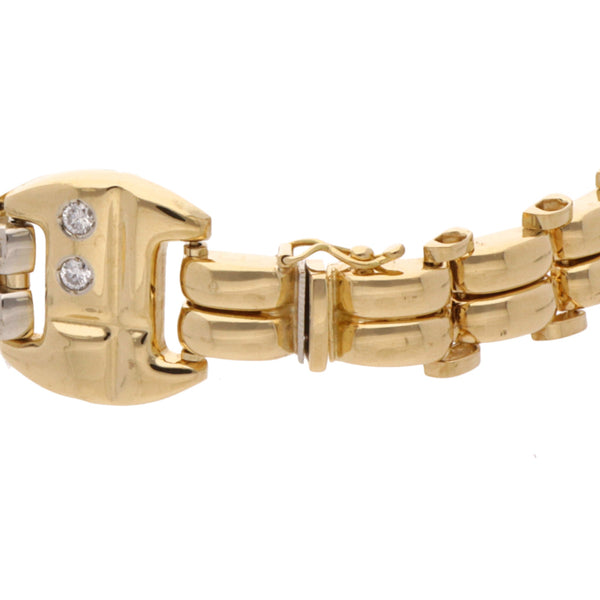 Pulsera eslabón articulado con sintéticos en oro amarillo 18 kilates.