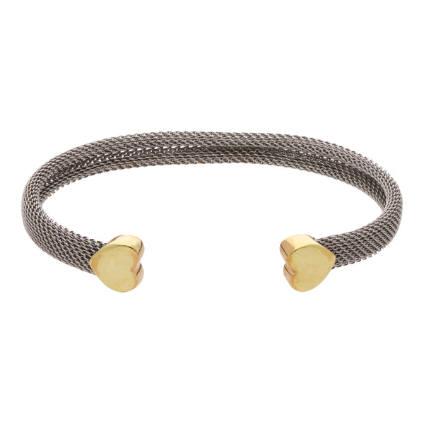 Pulsera abierta eslabón tejido en acero firma Tous con aplicaciones motivo corazón en oro amarillo 18 kilates.