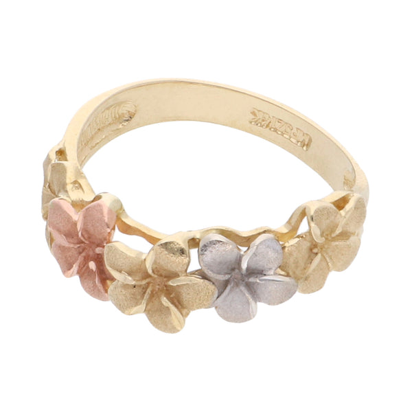 Anillo hechura especial motivo floral en oro tres tonos 14 kilates.