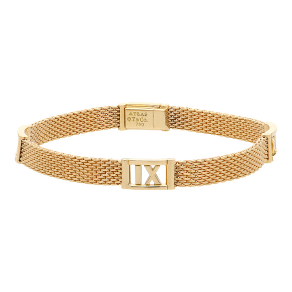 Pulsera eslabón tejido motivo números romanos en oro amarillo 18 kilates.