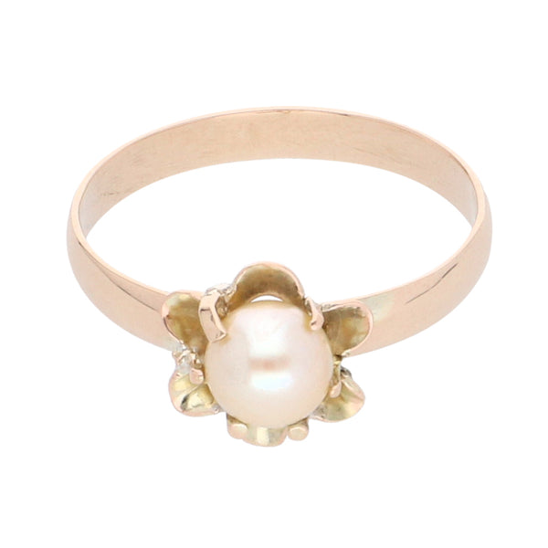 Anillo hechura especial con perla en oro amarillo 14 kilates.